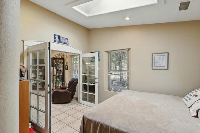 135B Sichler Rd SW, Los Lunas, NM 87031 - workout area featuring wood ceiling, a skylight, carpet, a ceiling fan, and brick wall