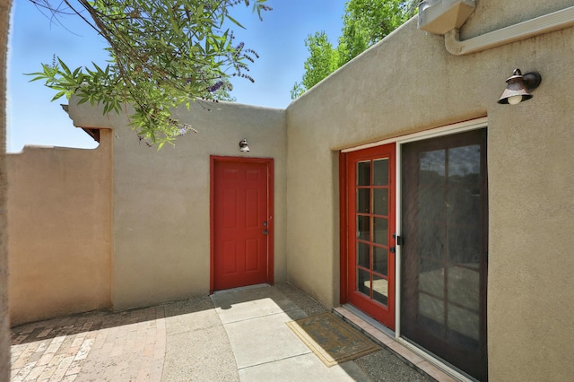 135B Sichler Rd SW, Los Lunas, NM 87031 - view of exterior entry with stucco siding