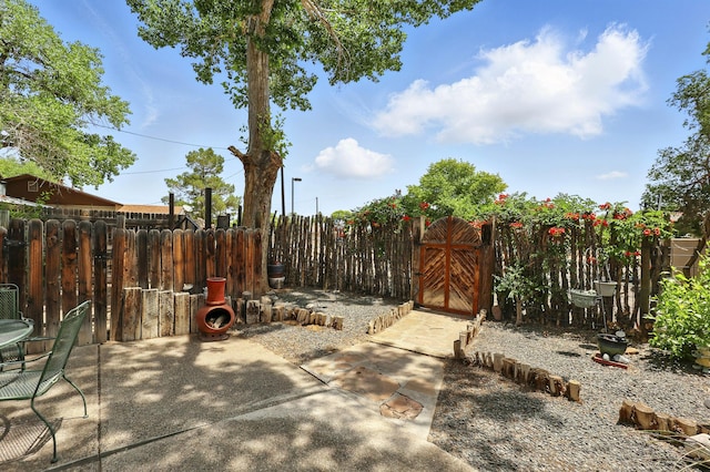 135B Sichler Rd SW, Los Lunas, NM 87031 - view of patio / terrace featuring a gate