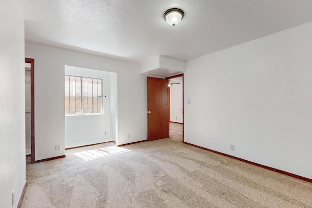 12522 Singing Arrow Ave SE, Albuquerque, NM 87123 - unfurnished room with carpet floors and baseboards