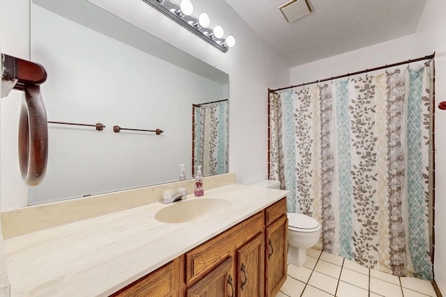 12522 Singing Arrow Ave SE, Albuquerque, NM 87123 - full bath with a shower with shower curtain, tile patterned flooring, vanity, and toilet