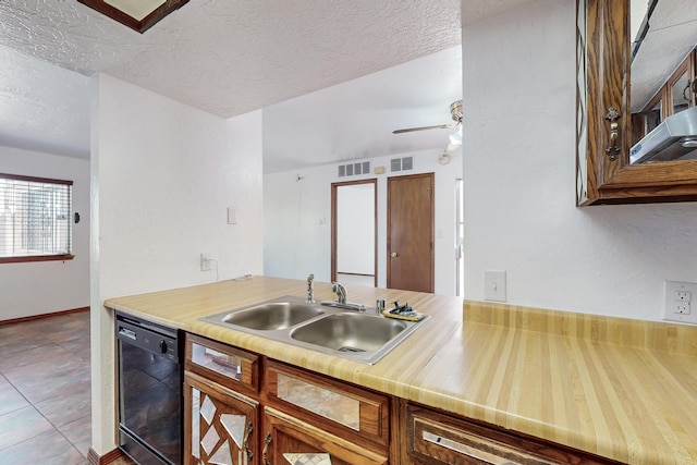 12522 Singing Arrow Ave SE, Albuquerque, NM 87123 - kitchen with a sink, visible vents, black dishwasher, and a textured ceiling