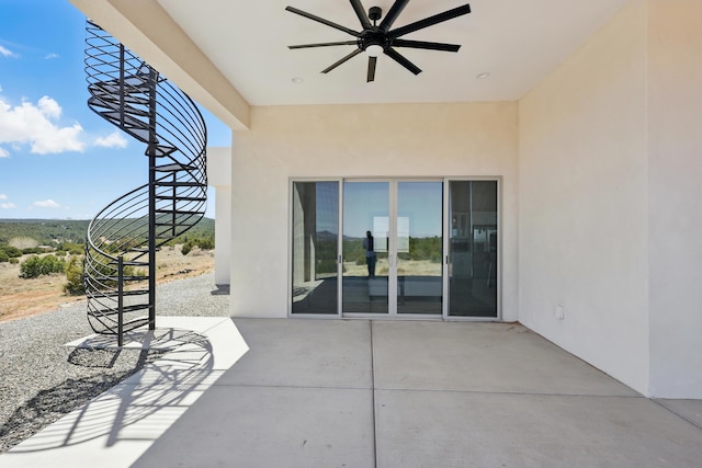 view of patio with ceiling fan