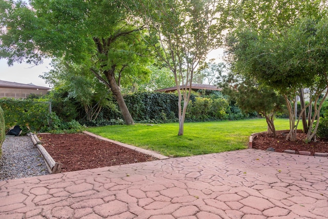 exterior space with fence and a patio area
