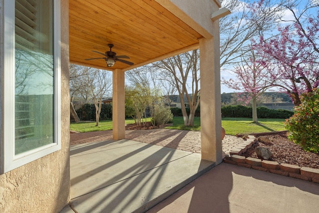 view of patio featuring a ceiling fan