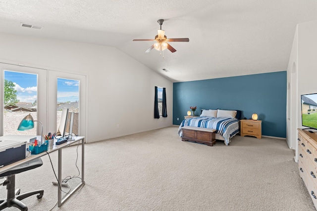 10532 Box Canyon Pl NW, Albuquerque, NM 87114 - bedroom with access to exterior, vaulted ceiling, light colored carpet, a desk, and ceiling fan