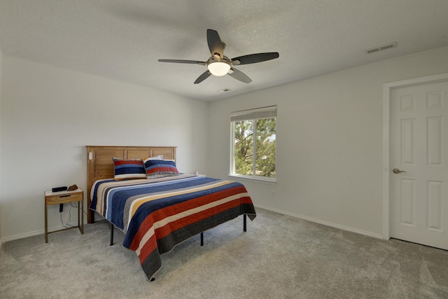 1807 Avenida Comunidad, Rio Rancho, NM 87124 - carpeted bedroom featuring ceiling fan, baseboards, and a textured ceiling