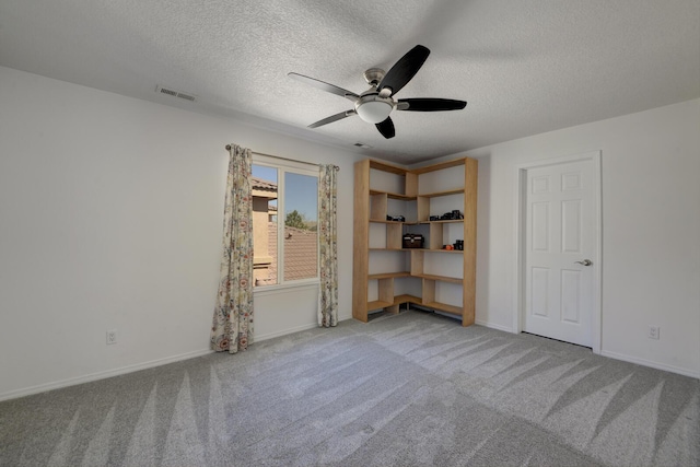 1807 Avenida Comunidad, Rio Rancho, NM 87124 - carpeted empty room featuring ceiling fan, a textured ceiling, and baseboards