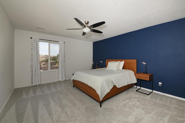 1807 Avenida Comunidad, Rio Rancho, NM 87124 - carpeted bedroom featuring a ceiling fan, baseboards, and a textured ceiling