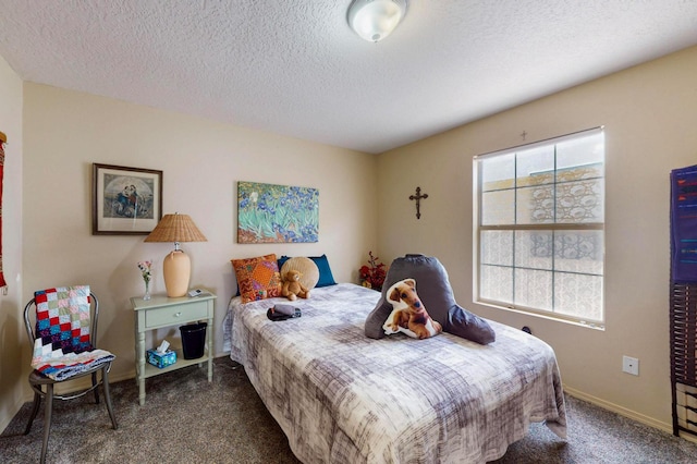 3940 Trailing Pl NW, Albuquerque, NM 87114 - bedroom with carpet flooring, a textured ceiling, and baseboards