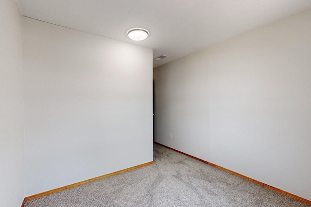 1647 Atrisco Dr SW, Albuquerque, NM 87105 - unfurnished room featuring light colored carpet and baseboards