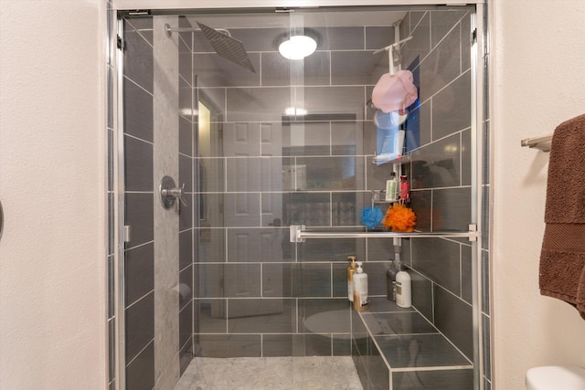2700 Vista Grande Dr NW Unit 56, Albuquerque, NM 87120 - bathroom featuring toilet and a stall shower