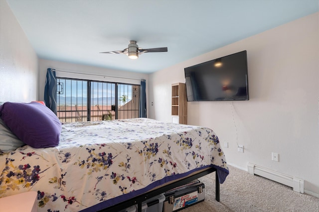 2700 Vista Grande Dr NW Unit 56, Albuquerque, NM 87120 - bedroom with baseboard heating, baseboards, access to outside, a ceiling fan, and carpet