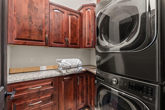 2912 William St SE, Albuquerque, NM 87102 - laundry area with cabinet space and stacked washer and dryer
