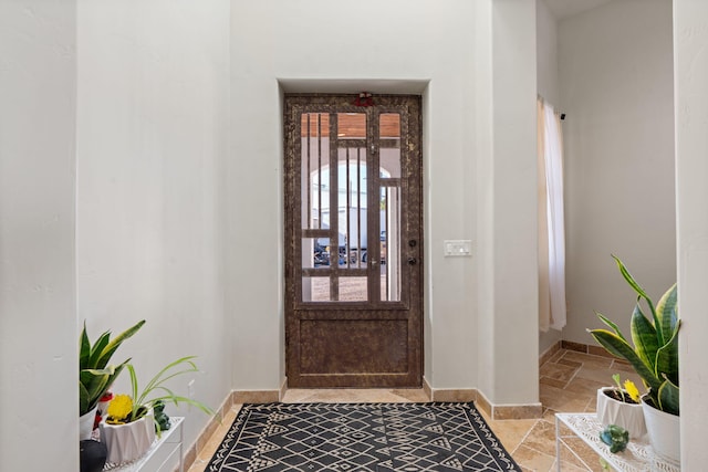 2912 William St SE, Albuquerque, NM 87102 - entrance foyer with baseboards and stone tile flooring