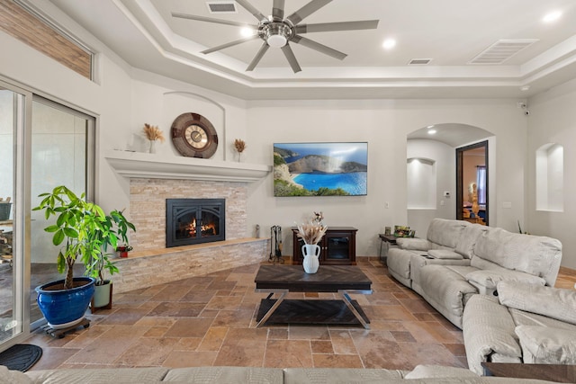 2912 William St SE, Albuquerque, NM 87102 - living room with a tray ceiling, stone tile floors, and visible vents