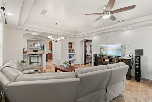 2912 William St SE, Albuquerque, NM 87102 - living area with arched walkways, visible vents, and a tray ceiling