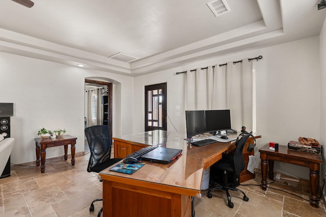 2912 William St SE, Albuquerque, NM 87102 - office space with arched walkways, stone tile flooring, a tray ceiling, and visible vents