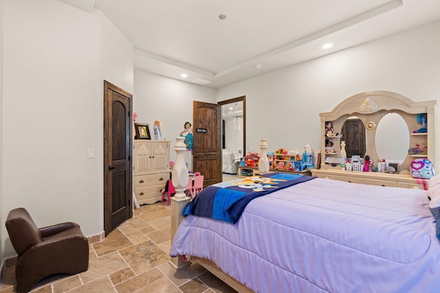 2912 William St SE, Albuquerque, NM 87102 - bedroom featuring stone tile flooring, recessed lighting, and a raised ceiling