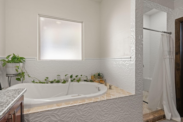 2912 William St SE, Albuquerque, NM 87102 - full bath with a bath, vanity, and a walk in shower