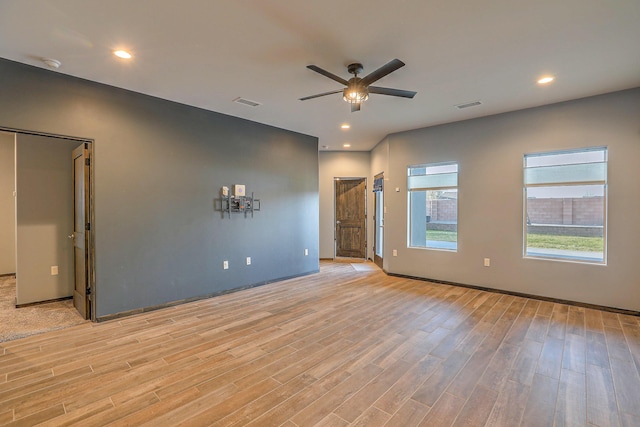 4621 27th Ave NE, Rio Rancho, NM 87144 - spare room featuring light wood-type flooring, ceiling fan, baseboards, recessed lighting, and a smoke detector