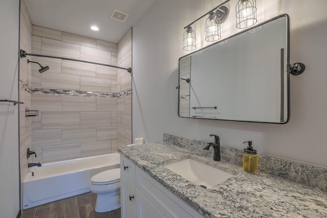 4621 27th Ave NE, Rio Rancho, NM 87144 - full bathroom featuring toilet, vanity, shower / bath combination, recessed lighting, and wood finished floors