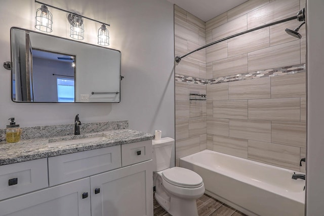 4621 27th Ave NE, Rio Rancho, NM 87144 - full bath featuring toilet, vanity, shower / bath combination, and wood finished floors