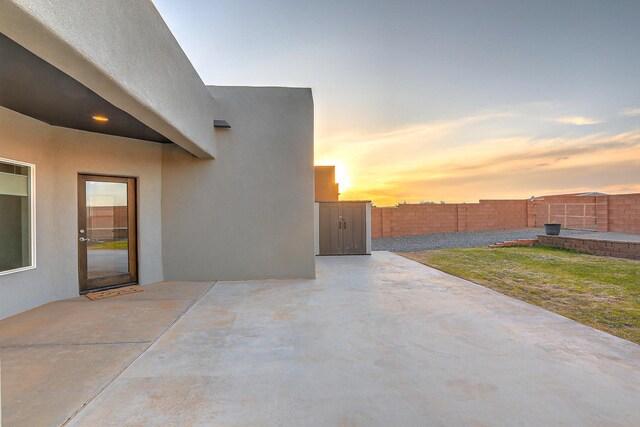 4621 27th Ave NE, Rio Rancho, NM 87144 - fenced backyard featuring a patio