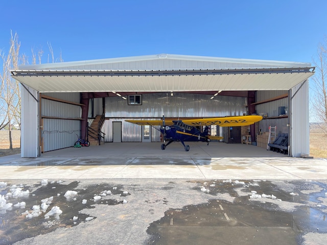 garage featuring a carport