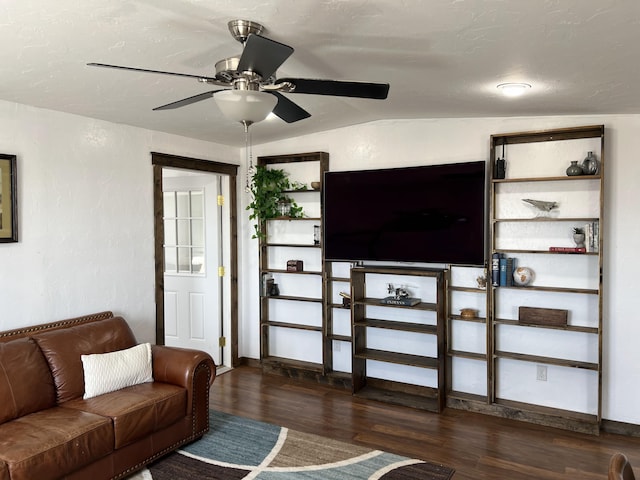 living area featuring ceiling fan and wood finished floors
