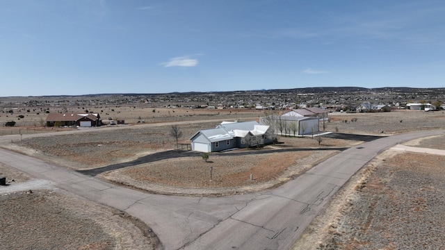 view of road featuring curbs