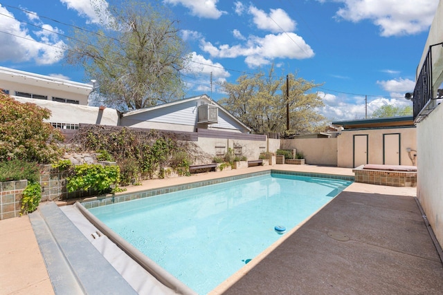 view of swimming pool with a fenced in pool and a fenced backyard