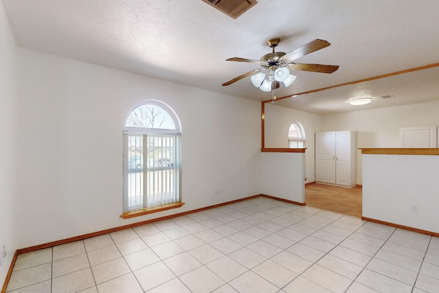 8021 Ruidoso Ct NE, Albuquerque, NM 87109 - unfurnished room featuring visible vents, baseboards, and ceiling fan
