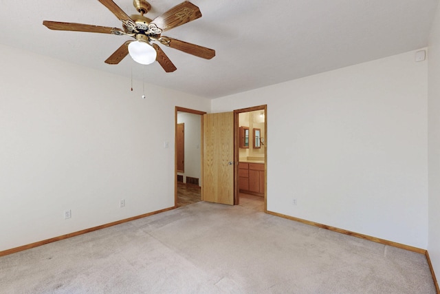 8021 Ruidoso Ct NE, Albuquerque, NM 87109 - unfurnished room featuring light carpet, baseboards, and ceiling fan