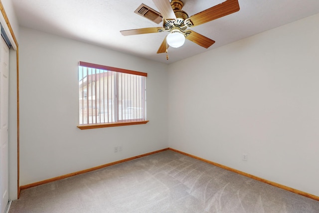8021 Ruidoso Ct NE, Albuquerque, NM 87109 - unfurnished bedroom featuring visible vents, a ceiling fan, a closet, baseboards, and light colored carpet