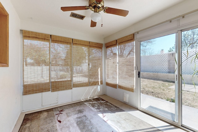 8021 Ruidoso Ct NE, Albuquerque, NM 87109 - unfurnished sunroom featuring a ceiling fan and visible vents