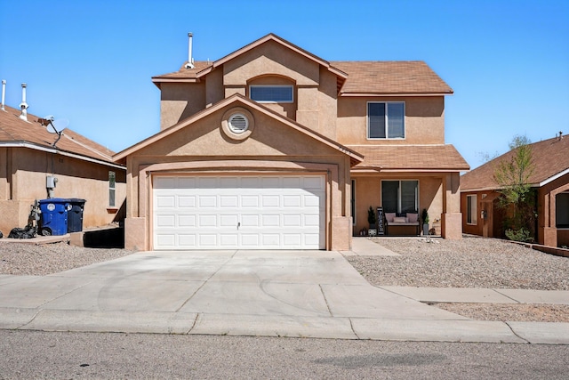 5909 Night Shadow Ave NW, Albuquerque, NM 87114 - traditional-style house with stucco siding, driveway, and an attached garage