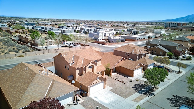 5909 Night Shadow Ave NW, Albuquerque, NM 87114 - aerial view of residential area with a mountainous background