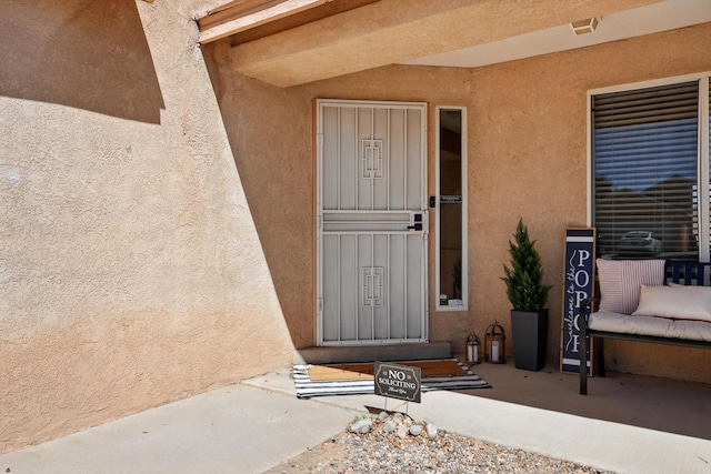 5909 Night Shadow Ave NW, Albuquerque, NM 87114 - property entrance with stucco siding