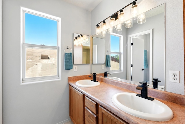 5909 Night Shadow Ave NW, Albuquerque, NM 87114 - bathroom featuring double vanity