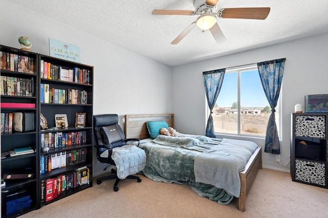 5909 Night Shadow Ave NW, Albuquerque, NM 87114 - carpeted bedroom with a textured ceiling and ceiling fan