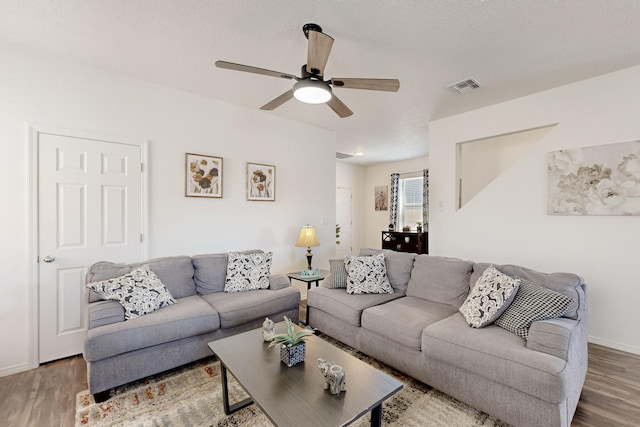 6300 Gannett Dr NE, Rio Rancho, NM 87144 - living room with wood finished floors and ceiling fan