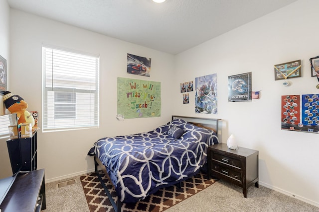 6300 Gannett Dr NE, Rio Rancho, NM 87144 - bedroom featuring carpet and baseboards