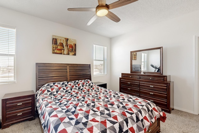 6300 Gannett Dr NE, Rio Rancho, NM 87144 - bedroom with light carpet and a ceiling fan