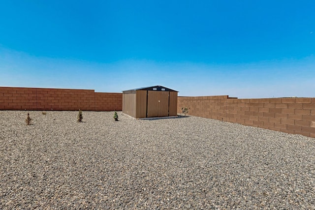 6300 Gannett Dr NE, Rio Rancho, NM 87144 - fenced backyard with a storage unit