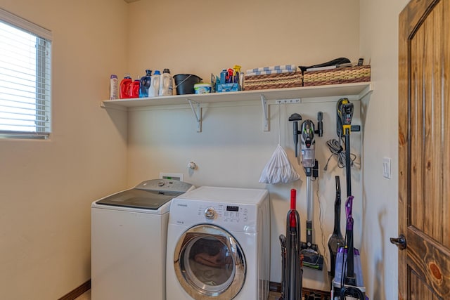 clothes washing area featuring laundry area and independent washer and dryer