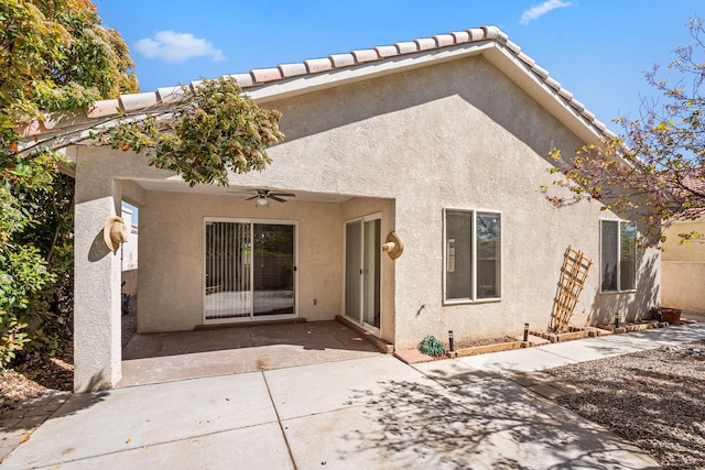 275 Chaparral Loop SE, Rio Rancho, NM 87124 - back of property with a patio area, a ceiling fan, and stucco siding