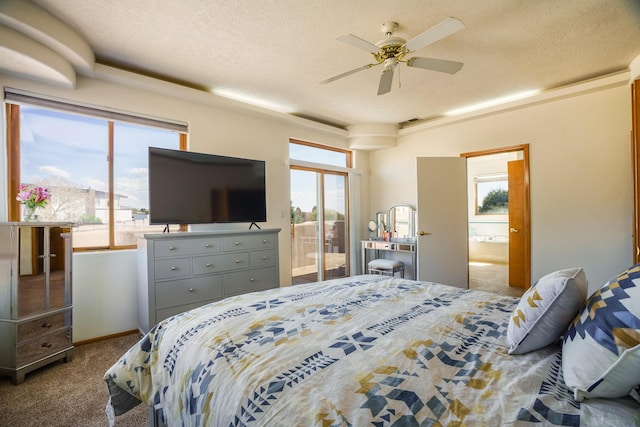 bedroom with a textured ceiling, carpet, baseboards, ensuite bath, and visible vents