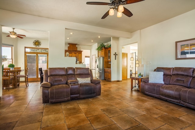 living room with recessed lighting and ceiling fan