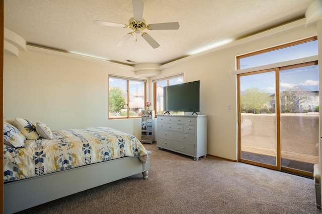 bedroom featuring a textured ceiling, access to exterior, visible vents, and carpet